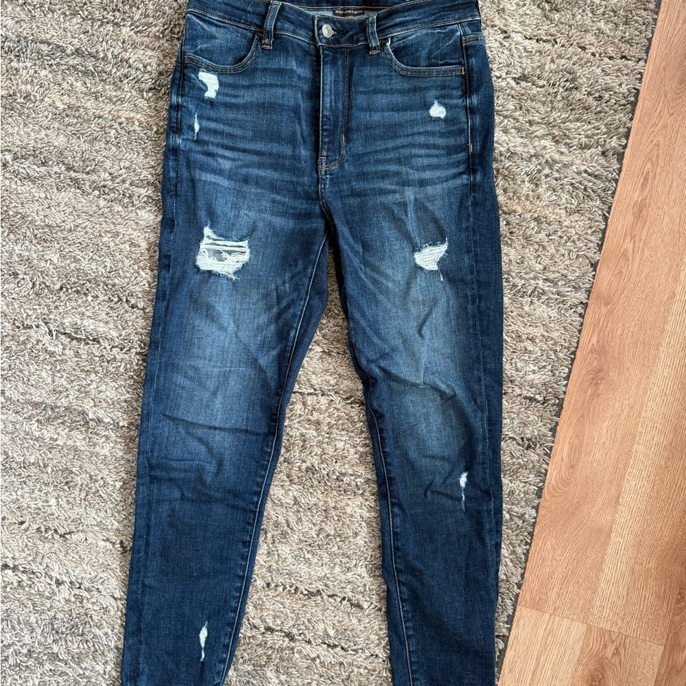 Distressed Blue Denim Jeans